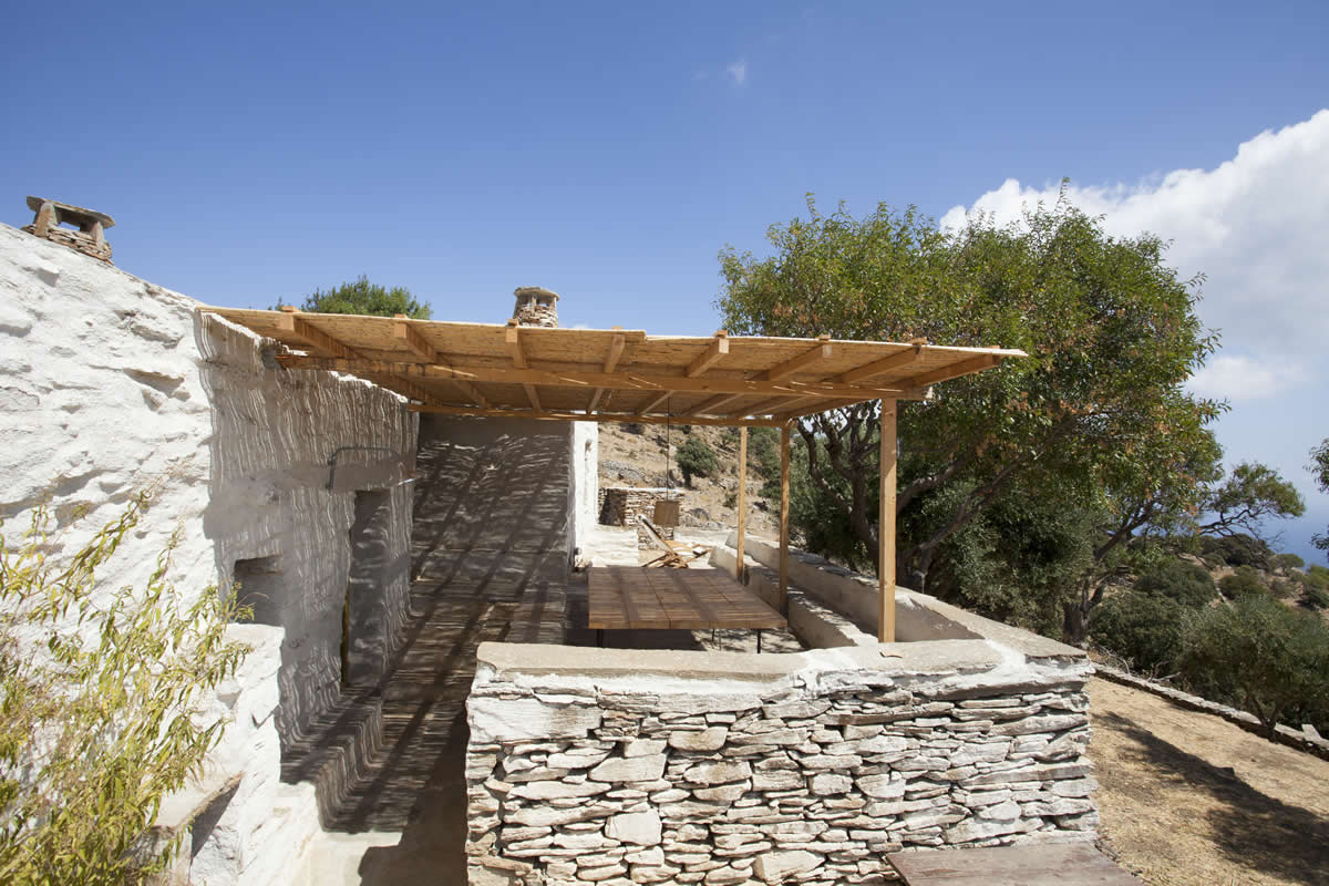 This old Cycladic traditional farmhouse in Kea island offers the best of two worlds: architectural tradition and relaxation in the farm. Feel cozy and inspired as soon as you enter the house: interior walls are corbelled inwards and are topped by a series of slabs which form the ceilings; the cement mortar floor, the joint stone walls, the wooden furniture, doors & windows reveal the beauty of craftmanship, simplicity and practicality.